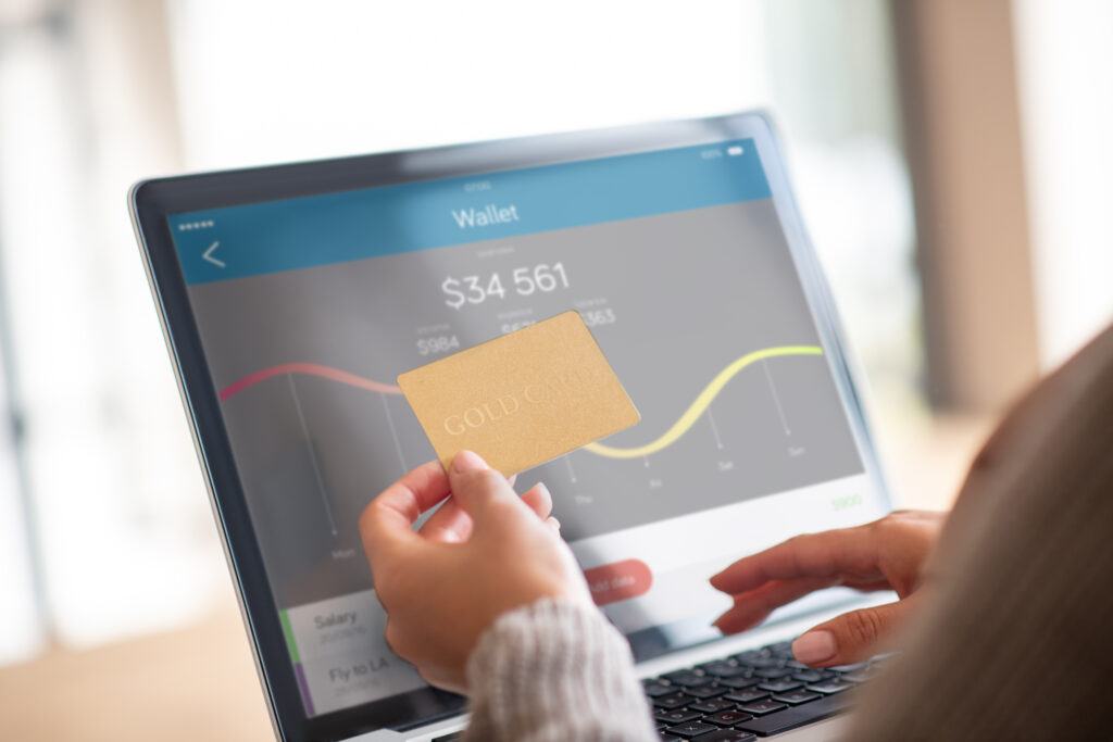 Close up of woman checking balance of bank account online